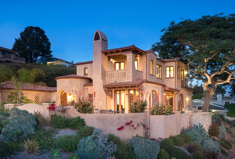 Sunny courtyard creates privacy buffer for hillside view home.